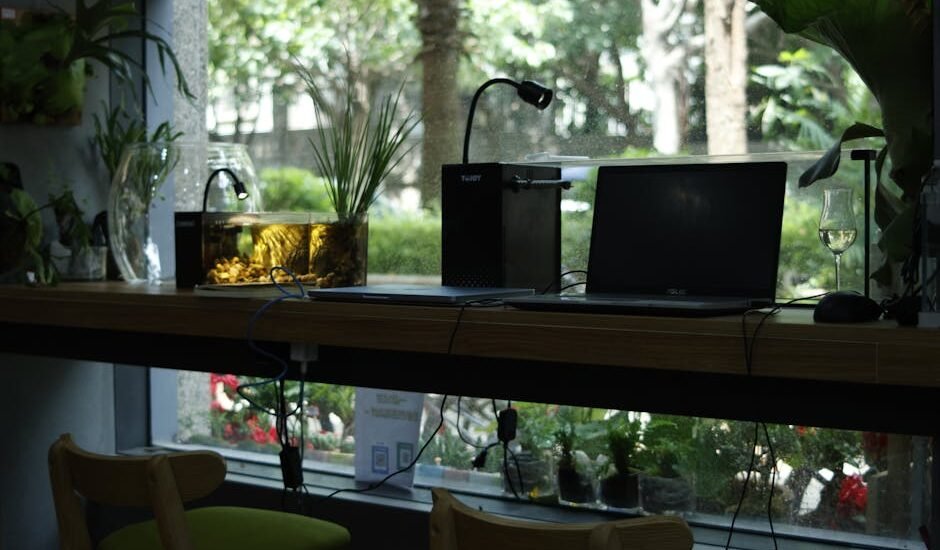 A workspace featuring a planted tank and equipment for CO2 atomization.