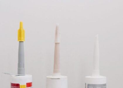 Three tubes of silicone sealant, relevant for removing old silicone from aquariums.