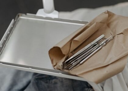 Aquascaping tools on a paper towel, illustrating cleaning methods for hobbyists.