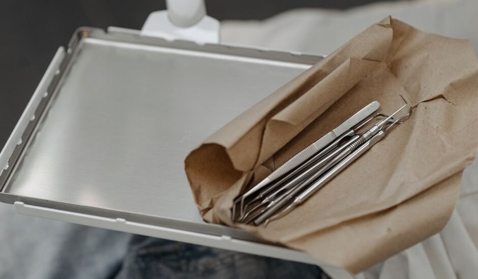 Aquascaping tools on a paper towel, illustrating cleaning methods for hobbyists.